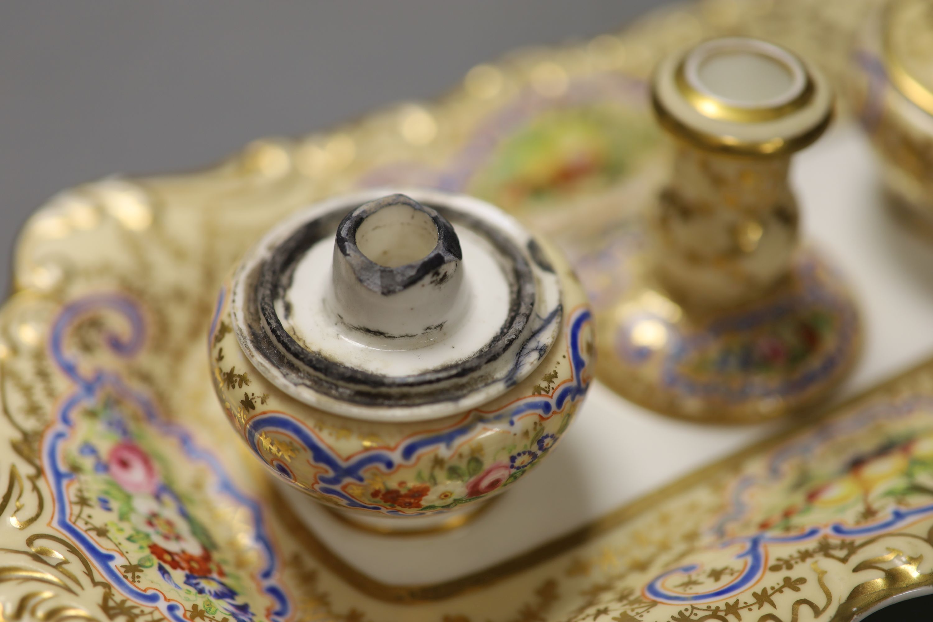 A Copeland and Garrett inkstand with fixed pots and candlestick and two covers,